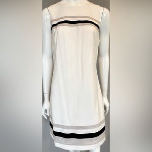 White shell dress excellent condition. Worn once